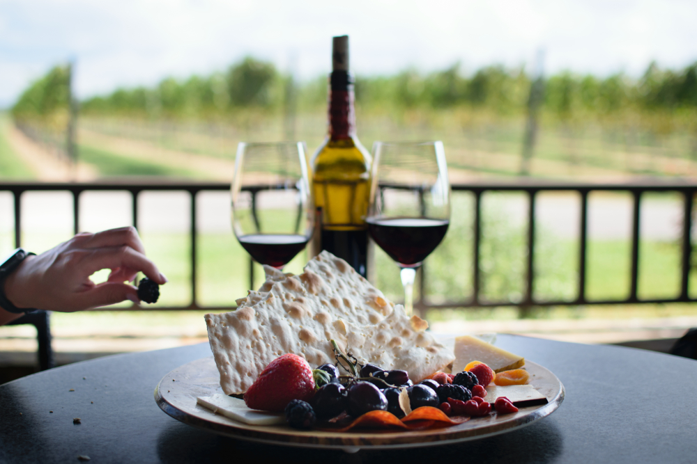 Wine tasting with food at Texas Wineries like Barons Creek Vineyards