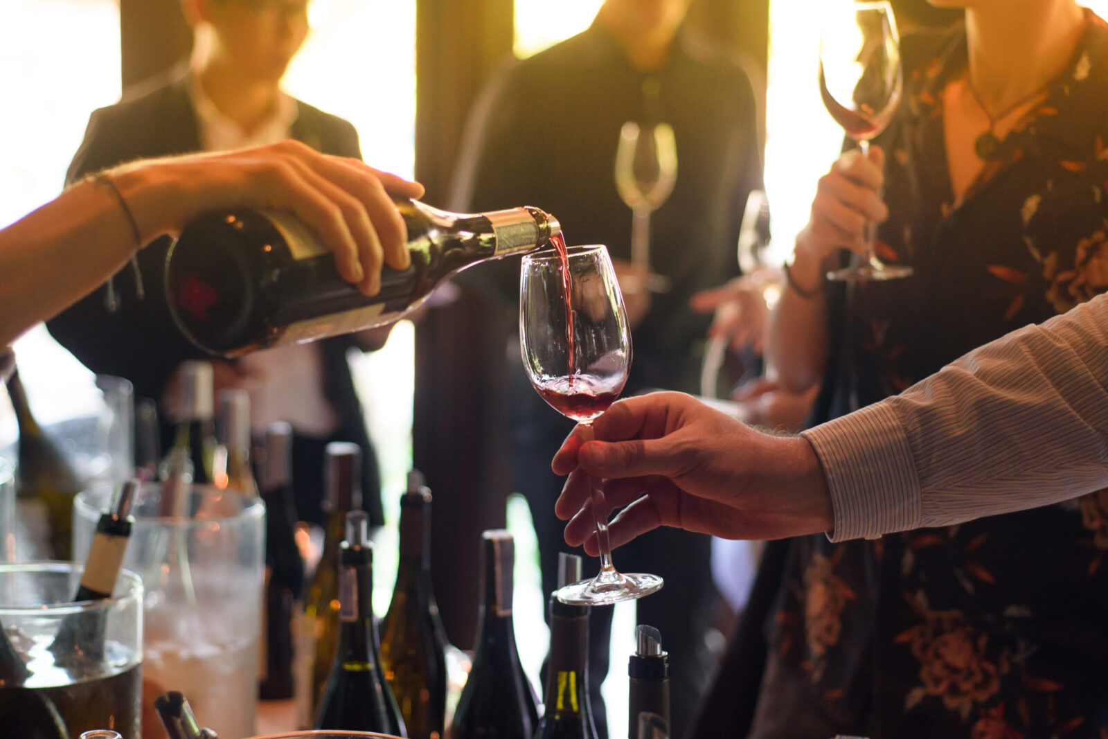 Wine being poured at wine tasting, one of the best things to do in Granbury TX.