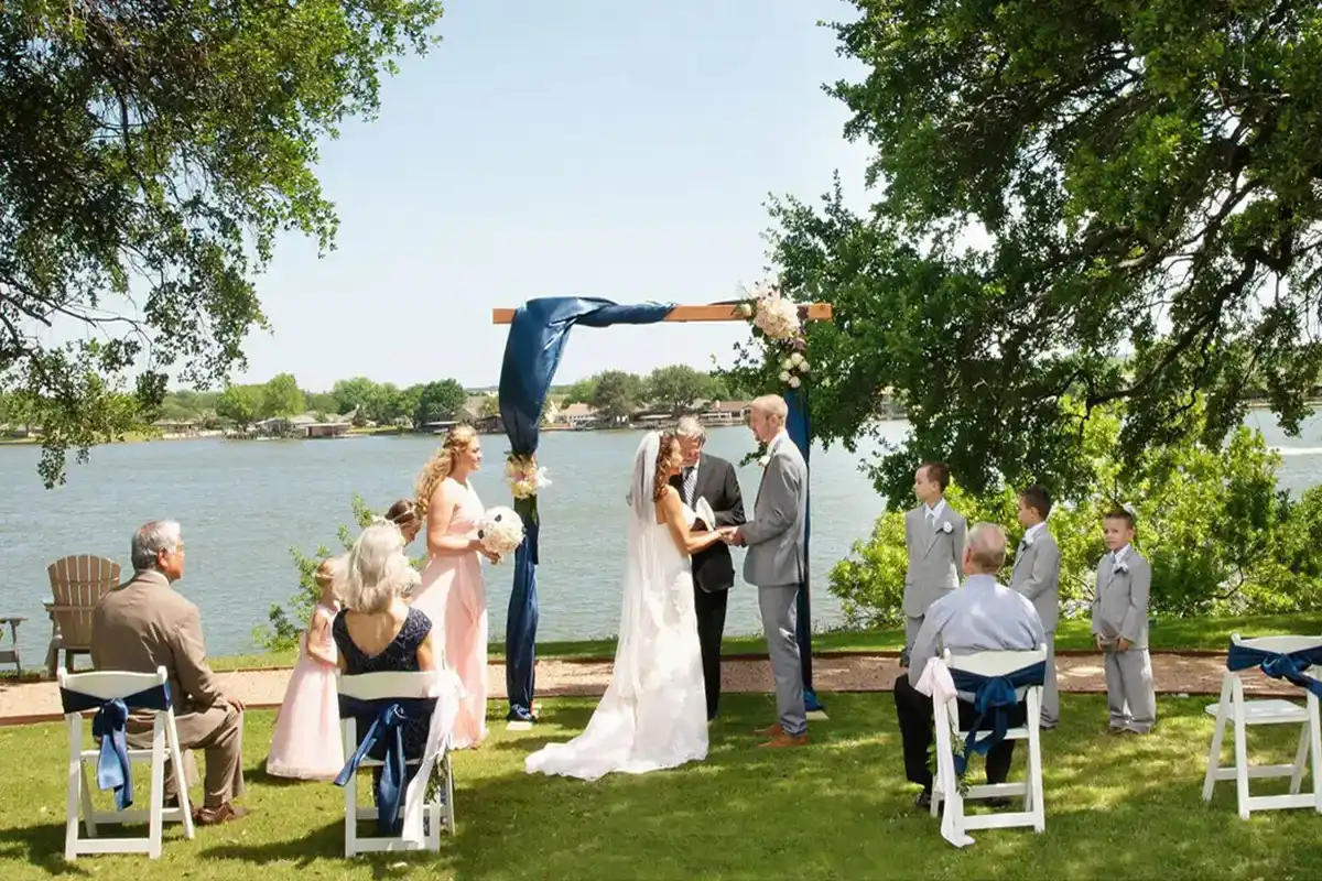 Wedding ceremony at the lakefront at one of the best places to elope in Texas.