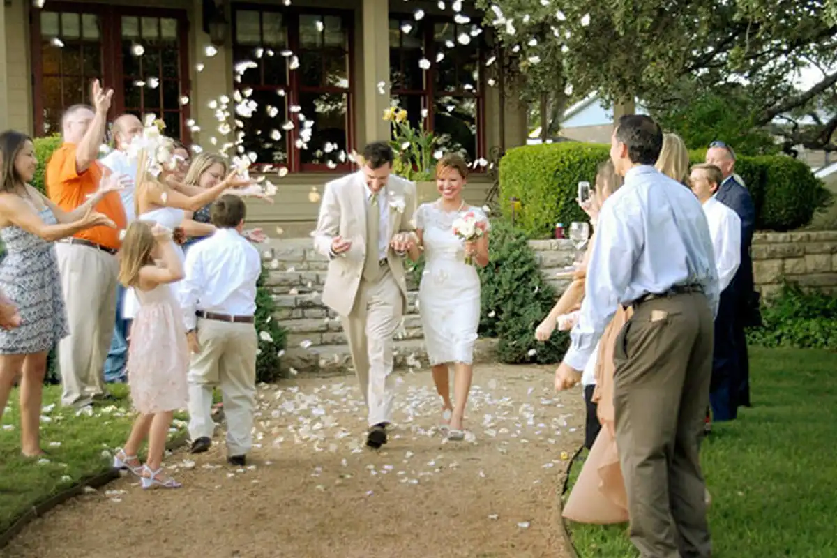 Couple leaving reception at our Boutique Hotel in Granbury, one of the best places to elope in Texas.